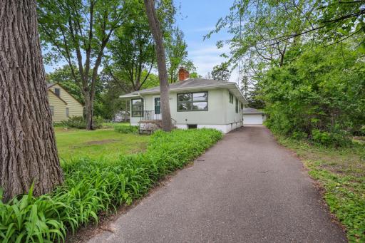 Long driveway and 2 stall garage offer plenty of parking