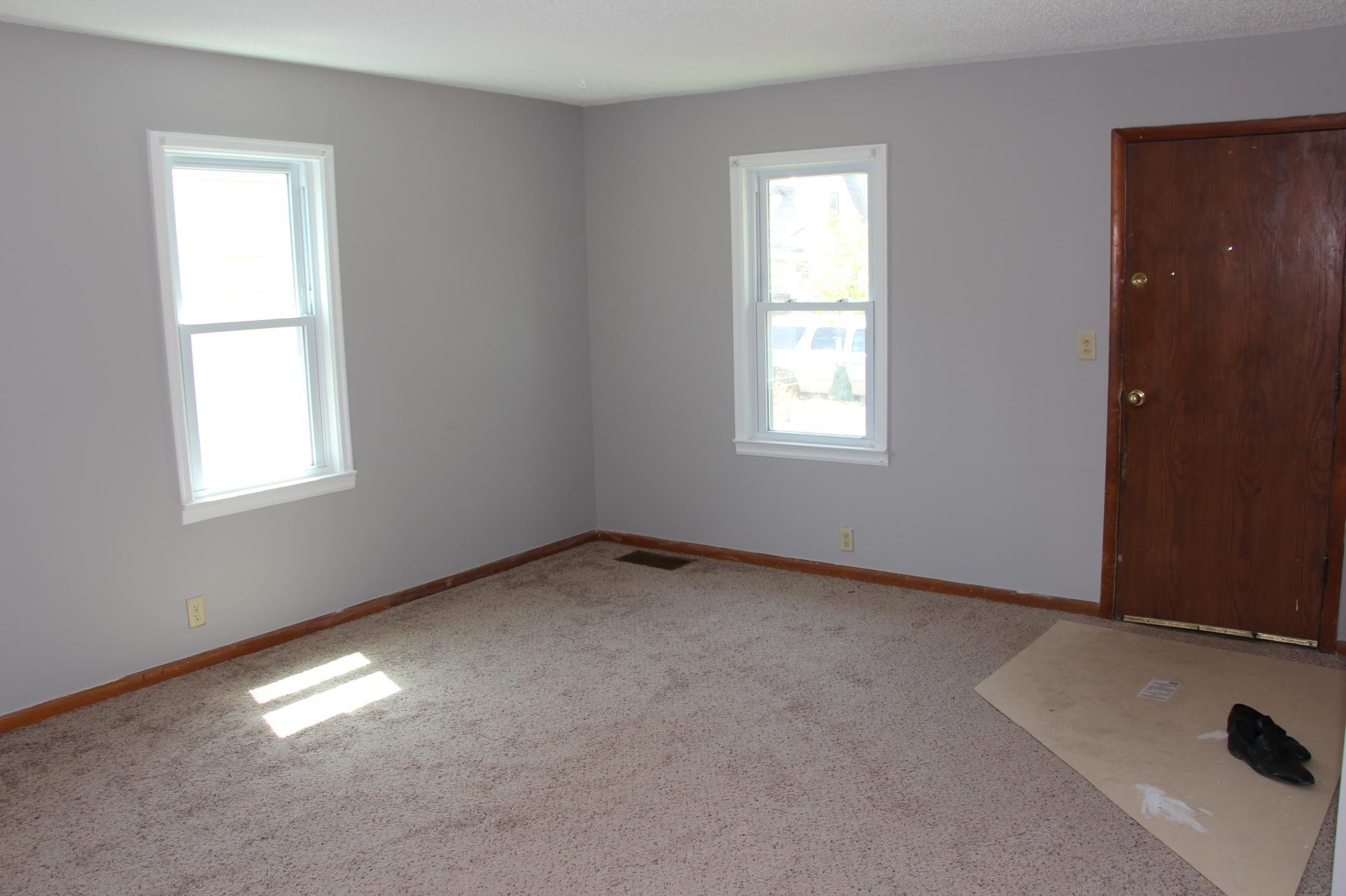The Living Room has newer carpeting and windows and has lots of natural light.