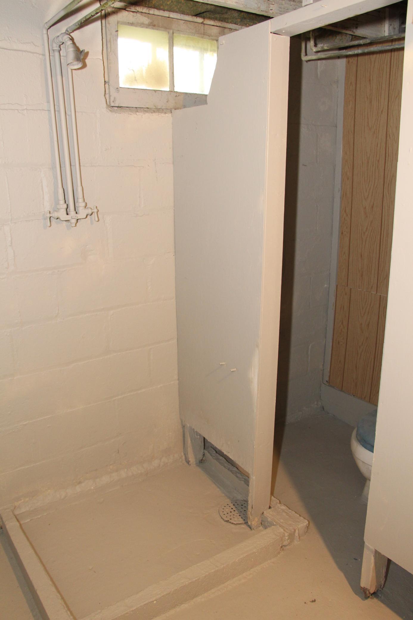 This is the 3/4 Bath in the basement by the fourth bedroom.