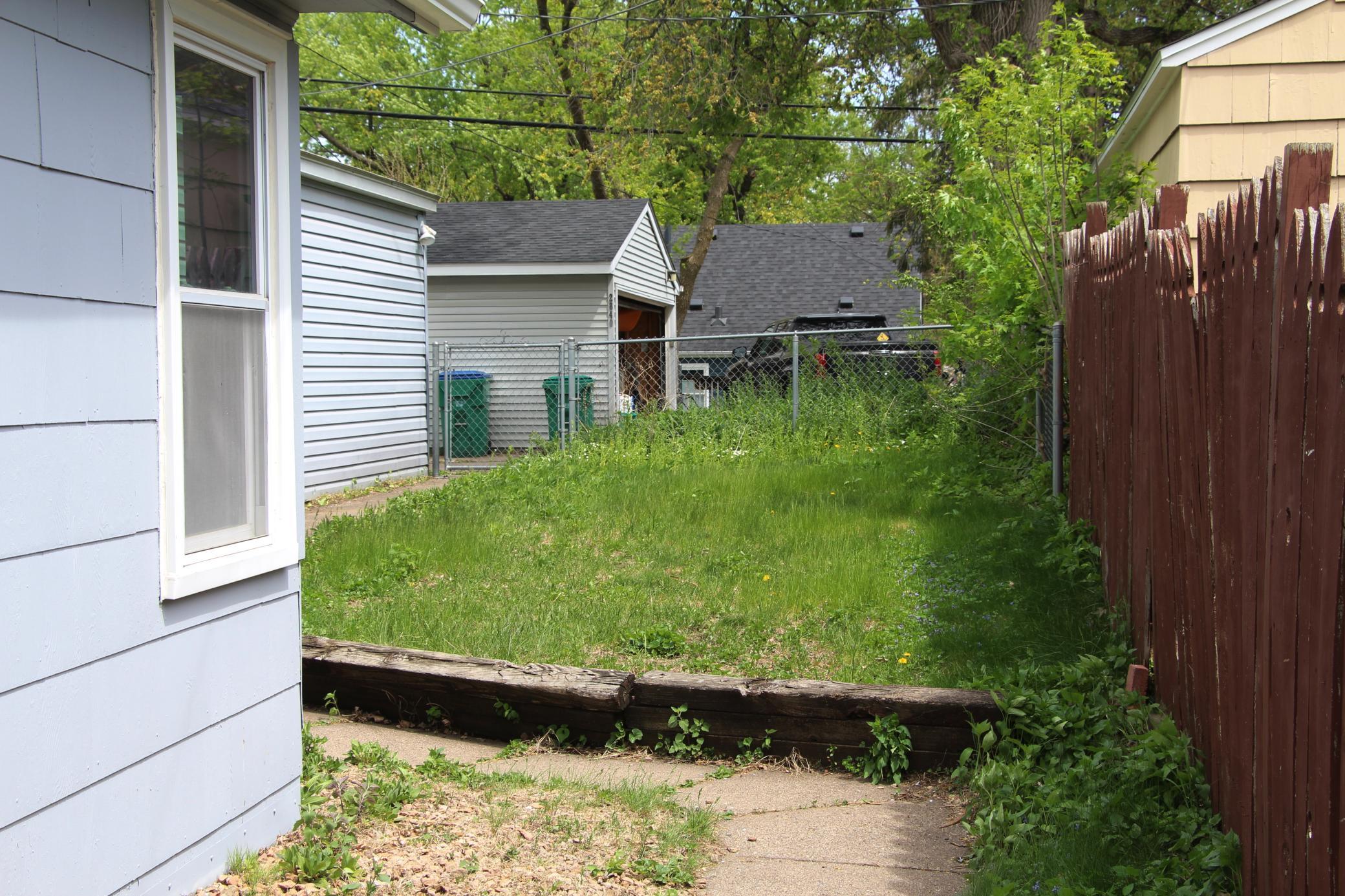 Here is your back yard that is almost completely fenced in. The good news....hardly anything to mow!