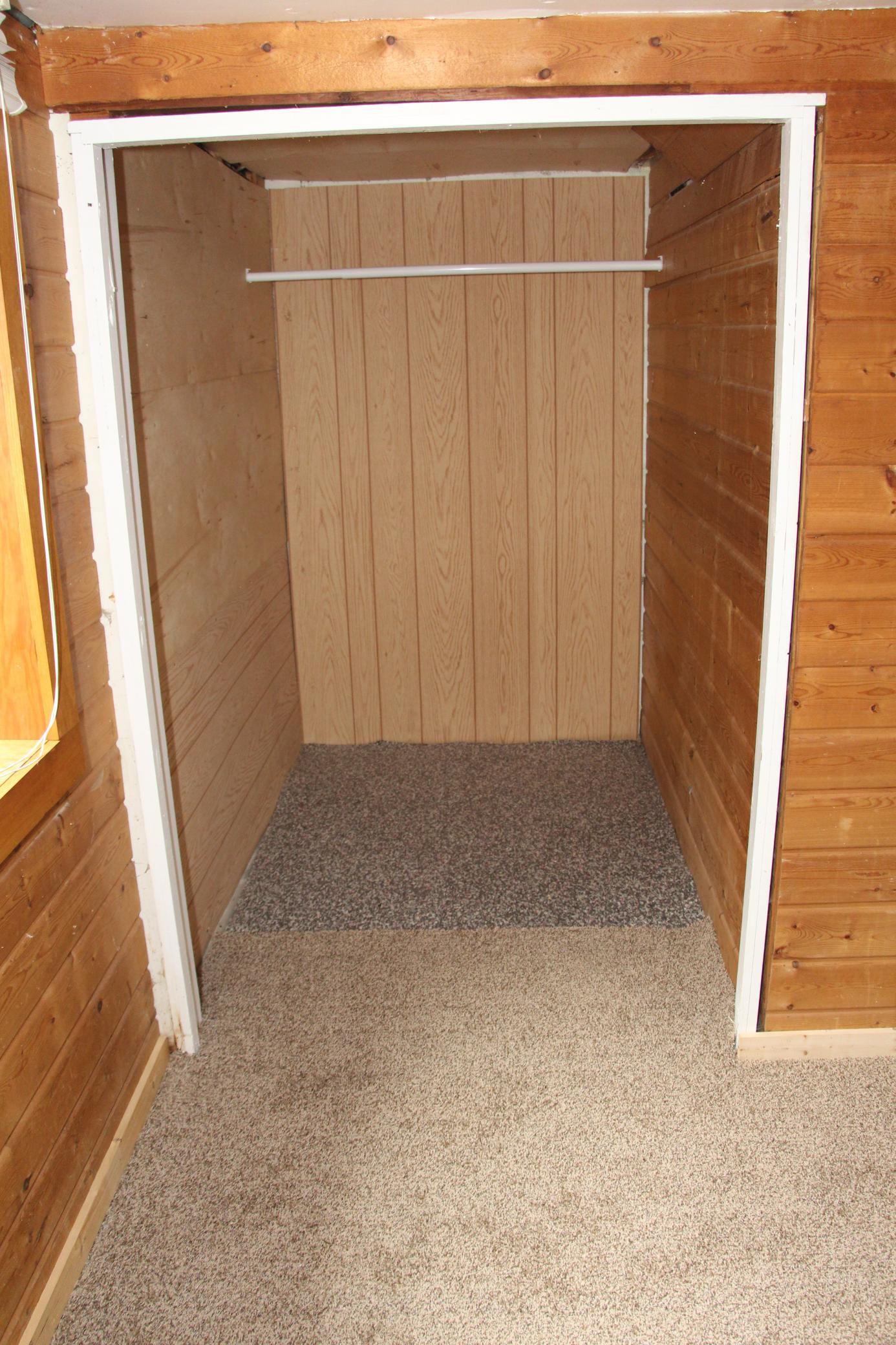 This is the large walk in closet in the basement. The seller will be installing the rest of the carpeting in this closet shortly.