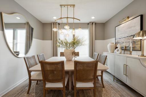 Your new dining room comfortably fits a full-size dining table with room to spare, great for hosting any event.