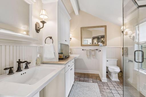 Ensuite bathroom with granite countertops