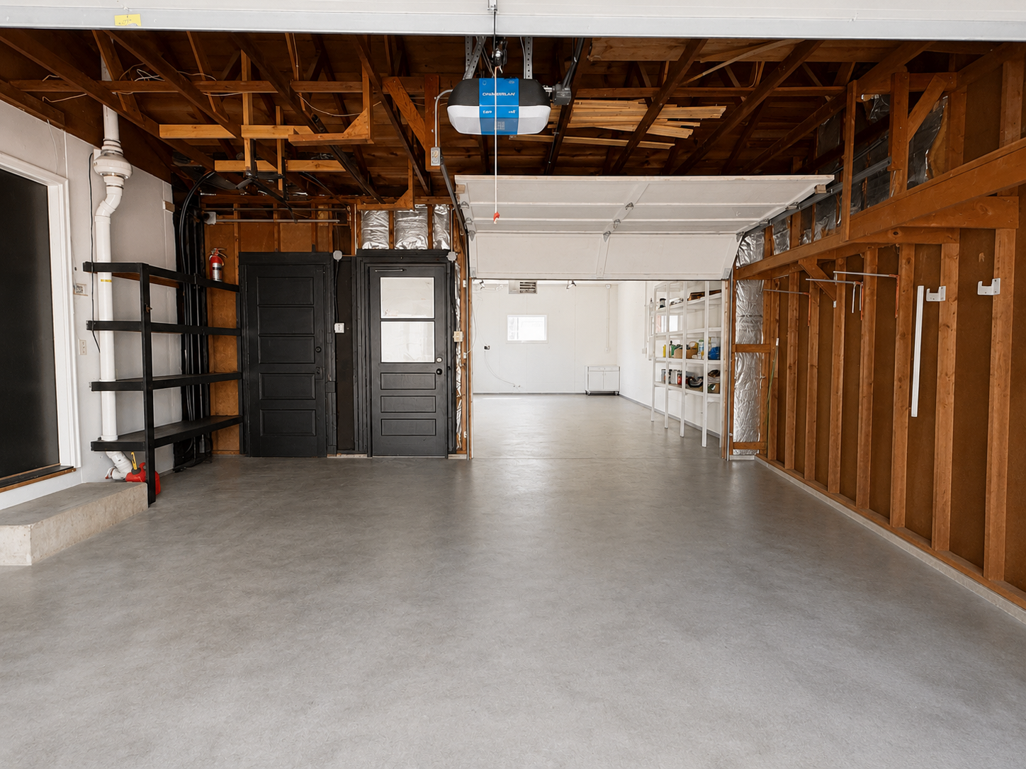 2 car garage (20x21’) + "shop" (25x15’) behind