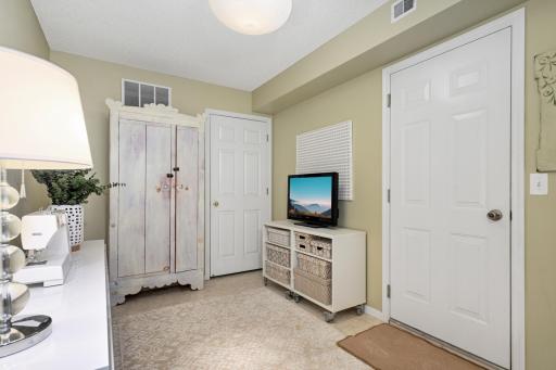 Lower level office/hobby room with access to the attached private garage.