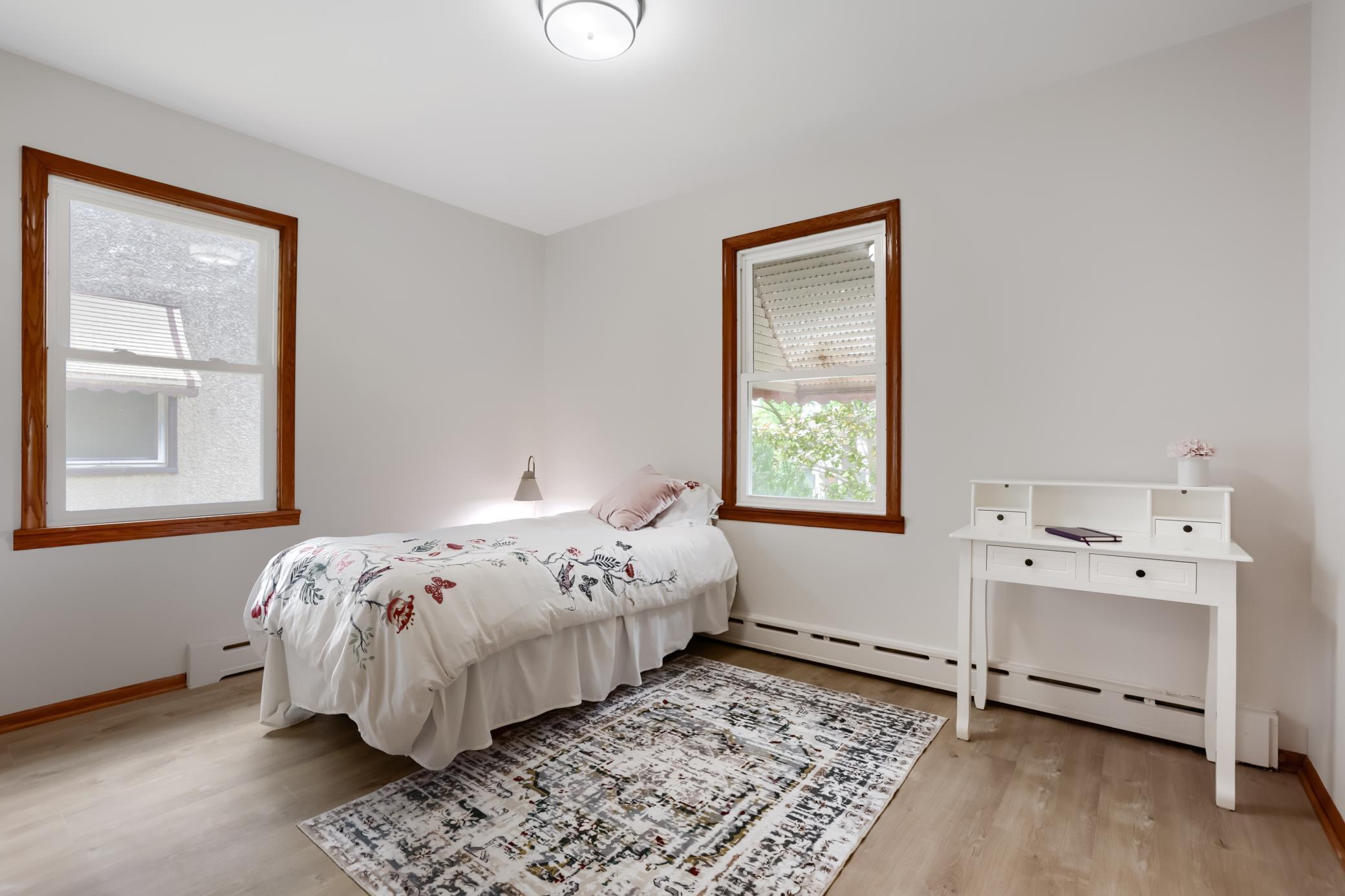 The bedrooms both offer fresh paint, new light fixtures, new LVP flooring and new solid core doors.