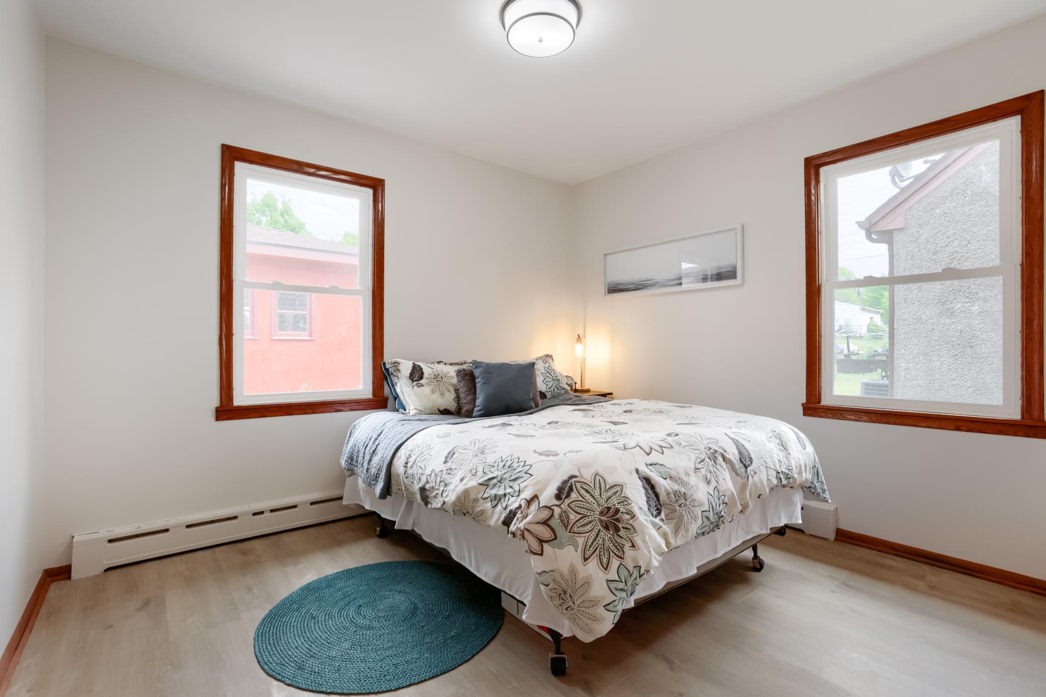 The bedrooms both offer fresh paint, new light fixtures, new LVP flooring and new solid core doors.