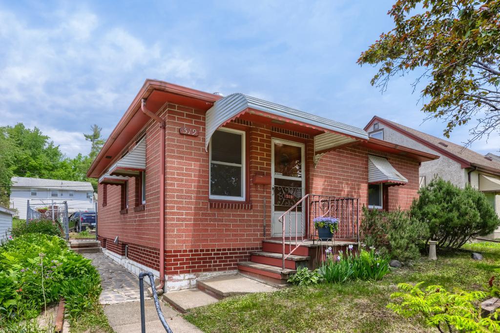 519 NE 36th Avenue is all brick with an updated roof and brand new windows.
