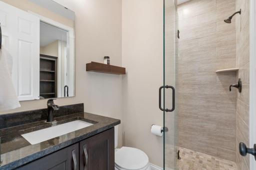 3/4 bathroom on main features gorgeous tilework.