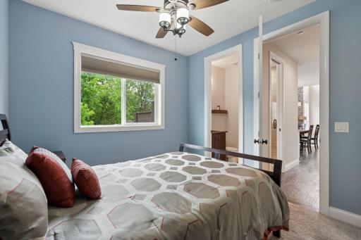 The coveted main floor bedroom features a 3/4 bath ensuite that is shared with the main level.