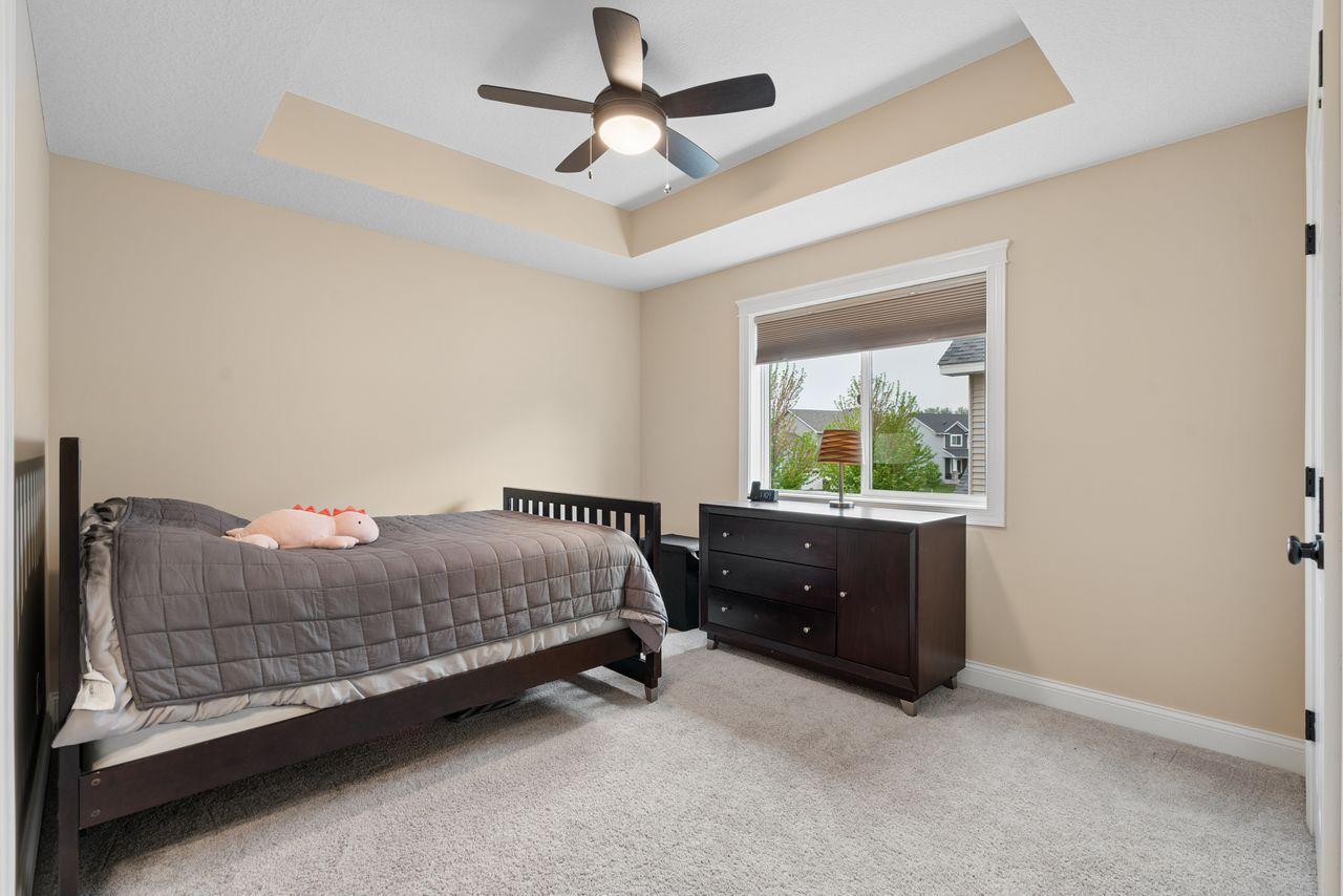 Spacious bedrooms with large closets connected by a jack and jill bathroom. All bedrooms on the upper level features tray ceilings.