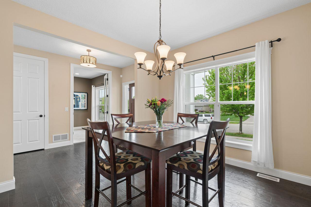 Formal dining to the left of the entry way effortlessly flows into the kitchen and informal dining space.