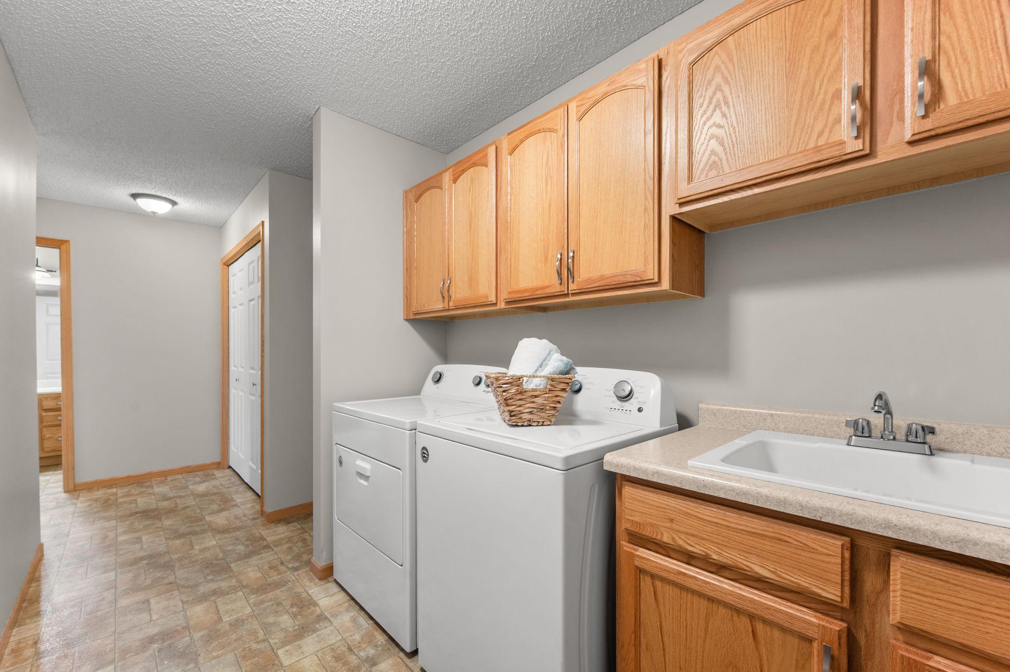 Wide hallways make for a great mudroom /laundry room!