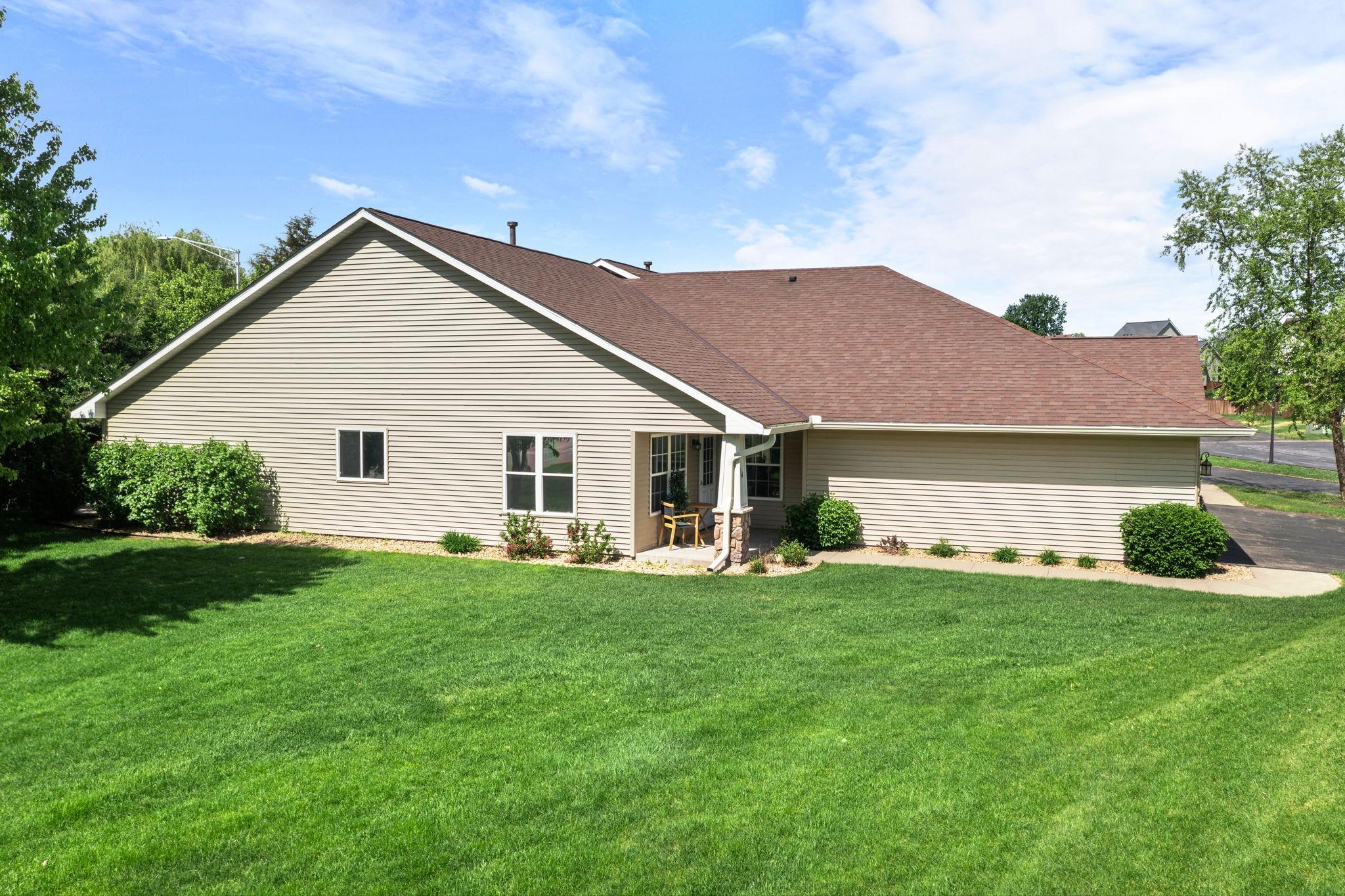 Enjoy a spacious side yard and private back patio