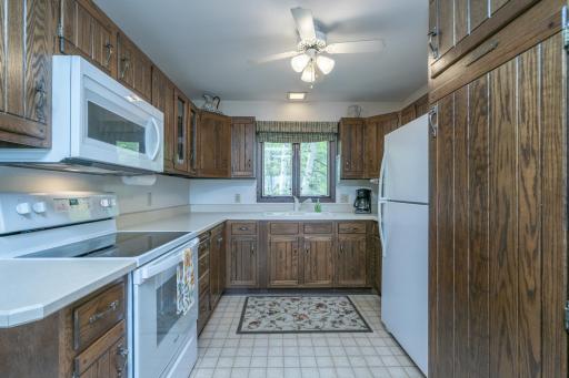 Functional kitchen layout designed for easy meal prep and gathering after long lake days.