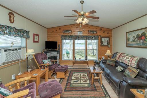 Warm and inviting living spaces filled with natural light and beautiful lake views.