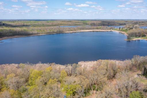 Stunning aerial views showcase this peaceful bay setting on beautiful Big Sandy Lake.