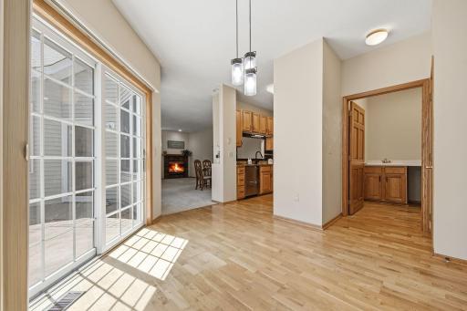 This is the view from the dining area back toward the rest of the house. Note: Open doorway on right leads to the laundry room. There's also a large coat closet in the near foreground.