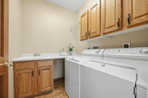 You'll appreciate a fantastic laundry room, complete with a laundry sink and lots of storage.