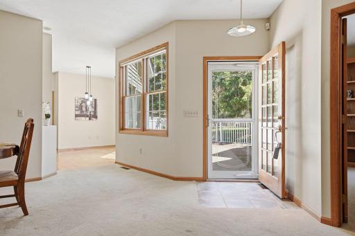Your front entry is warm and inviting. Note: nine foot ceilings give this home an airy, open feel
