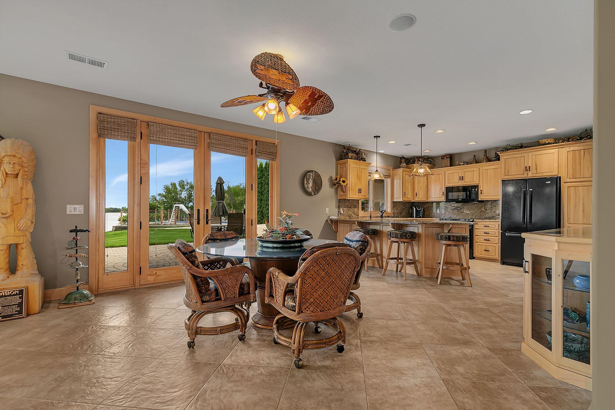 Ceiling fan improves air circulation and everyday comfort. Views to the river enjoyed at every angle.