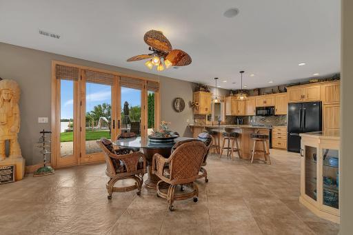 Ceiling fan improves air circulation and everyday comfort. Views to the river enjoyed at every angle.
