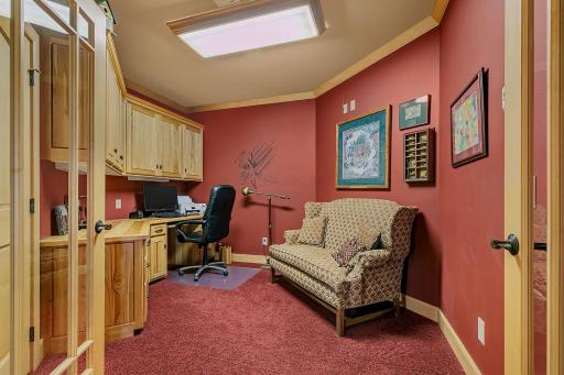 Functional lower level office provides a quiet and productive environment. This is one of numerous flex spaces that could be addtional bedroom space.