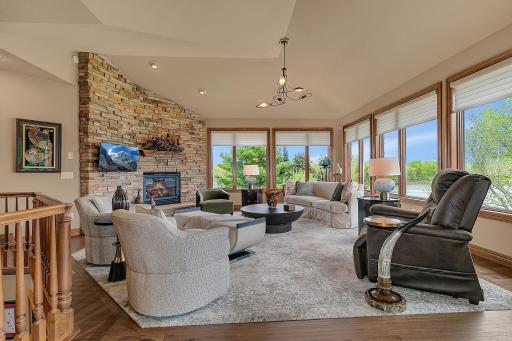 Beautiful floor to ceiling bricked in fireplace. Updated recently with new carpet and luxury Vinyl planking. This seller continued improving this home through out their ownership.
