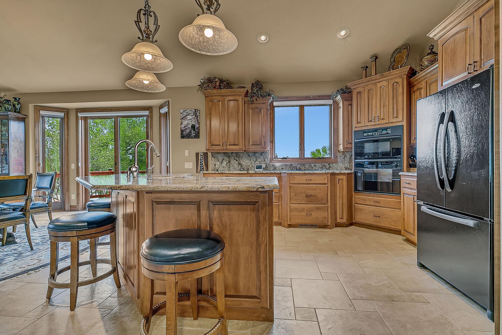 Large center island to prepare your meals. All counters in this area are raised, for good ergonomics.