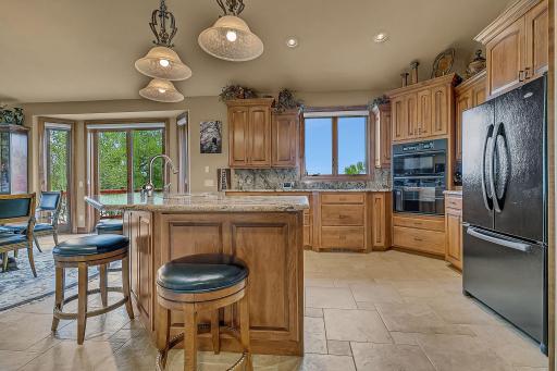 Large center island to prepare your meals. All counters in this area are raised, for good ergonomics.