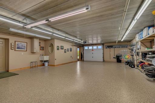 Walks out to your backyard retreat and lends direct access into the home. Tuck under garage is so dynamic for use. Water toys, overflow seating, art studio, play area in the winter. Heated, insulated and full finished. Utility sink too.
