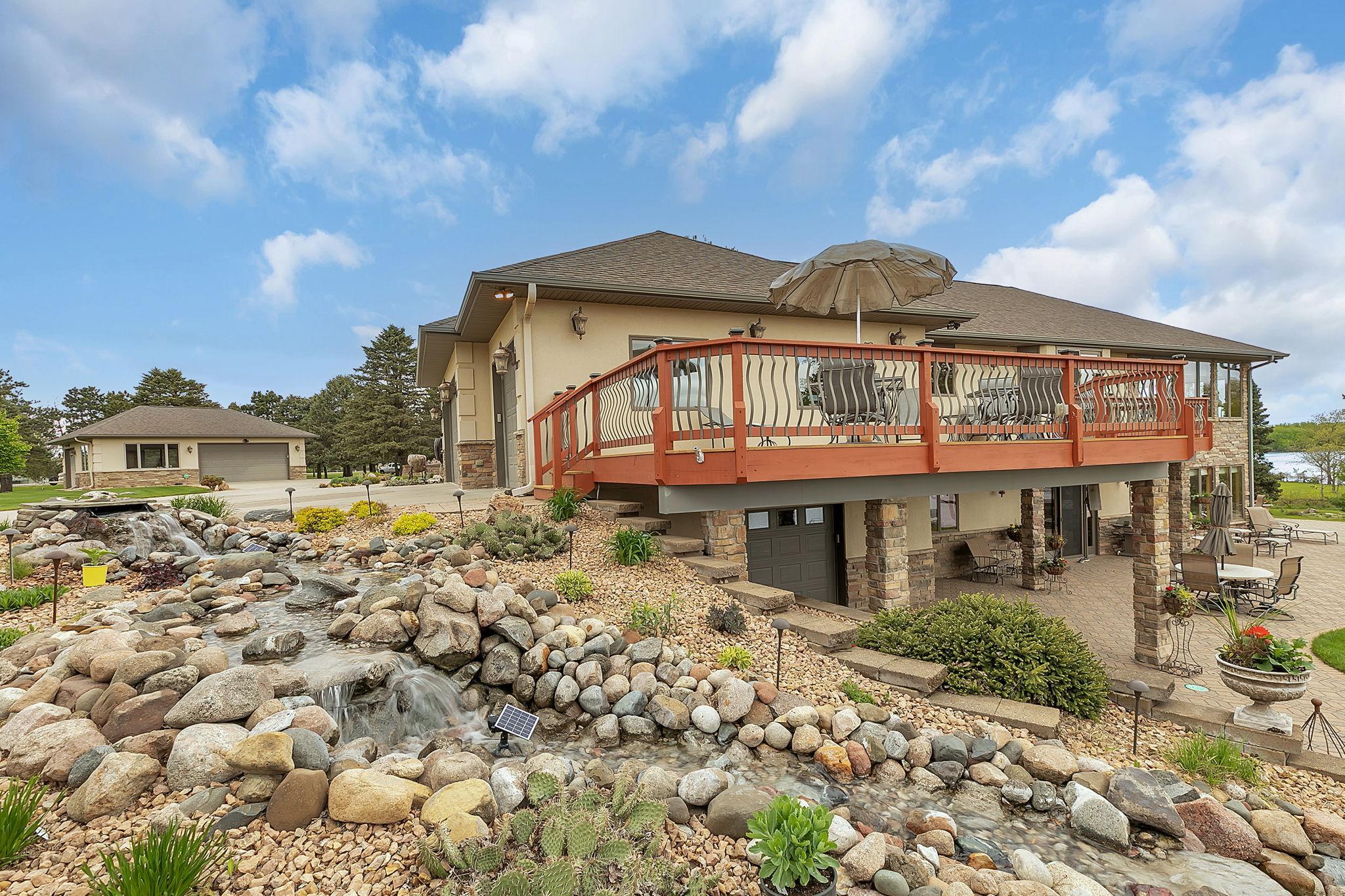 Natural water feature adds to the peaceful ambiance of the property.