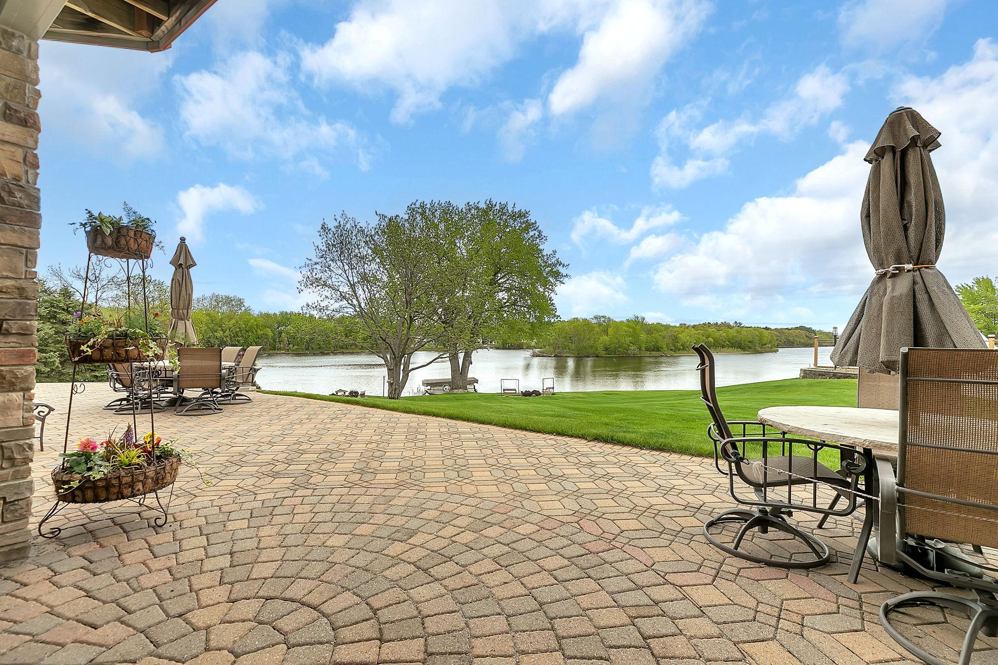 Enjoy quiet outdoor moments on the relaxing patio space. The hardscapes come alive as the season progresses with flowers and friends.