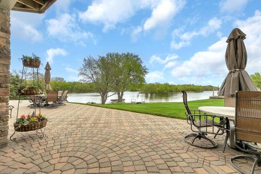 Enjoy quiet outdoor moments on the relaxing patio space. The hardscapes come alive as the season progresses with flowers and friends.