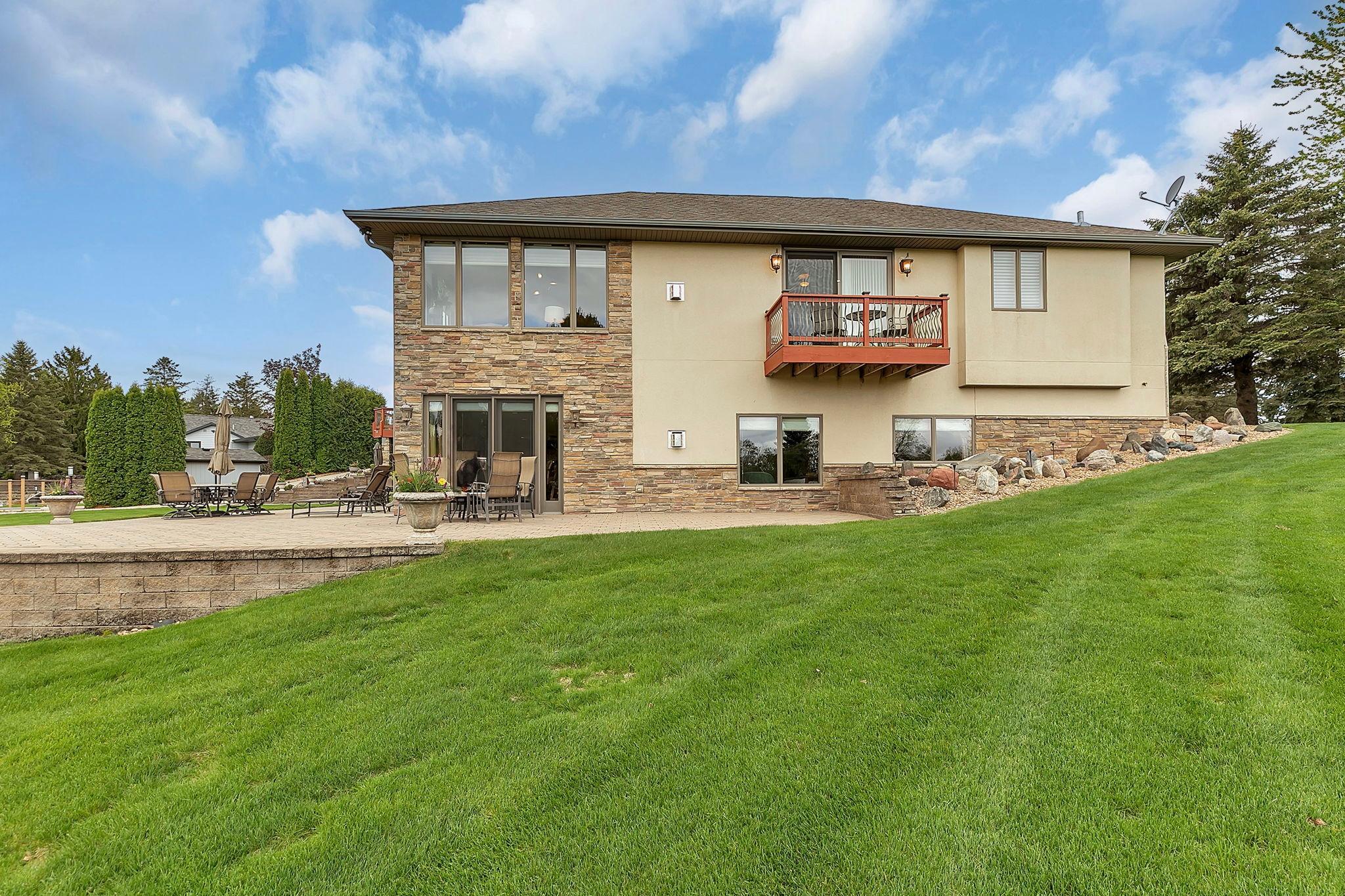 Side yard showcases side patio and private owners suite deck.