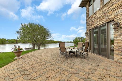 Wrap-around patio allows enjoyment of views from multiple sides of the home.