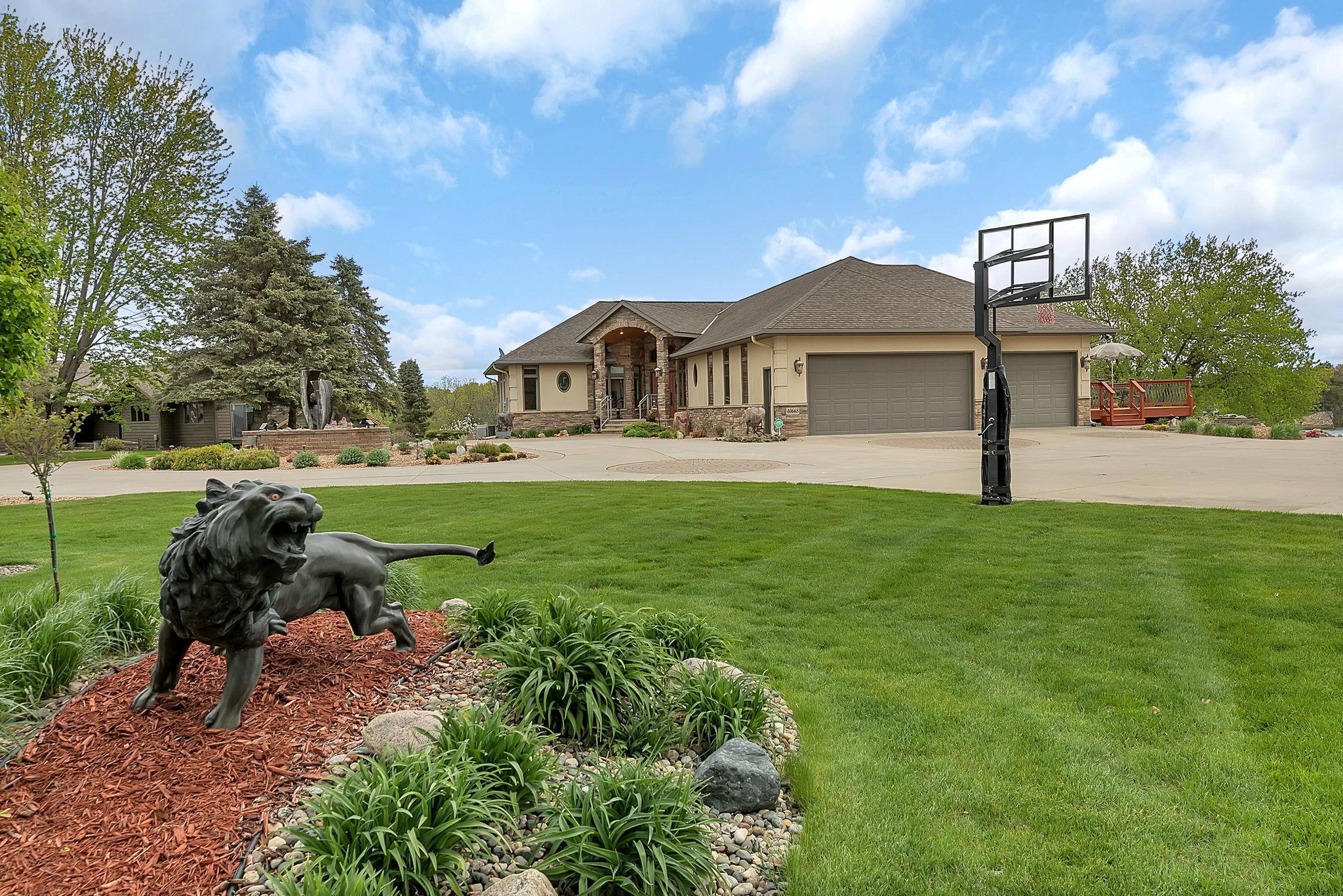 Garden statue adds visual interest and charm to the outdoor space.