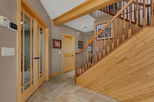 Open stairwell to the upper level allows for more natural light.