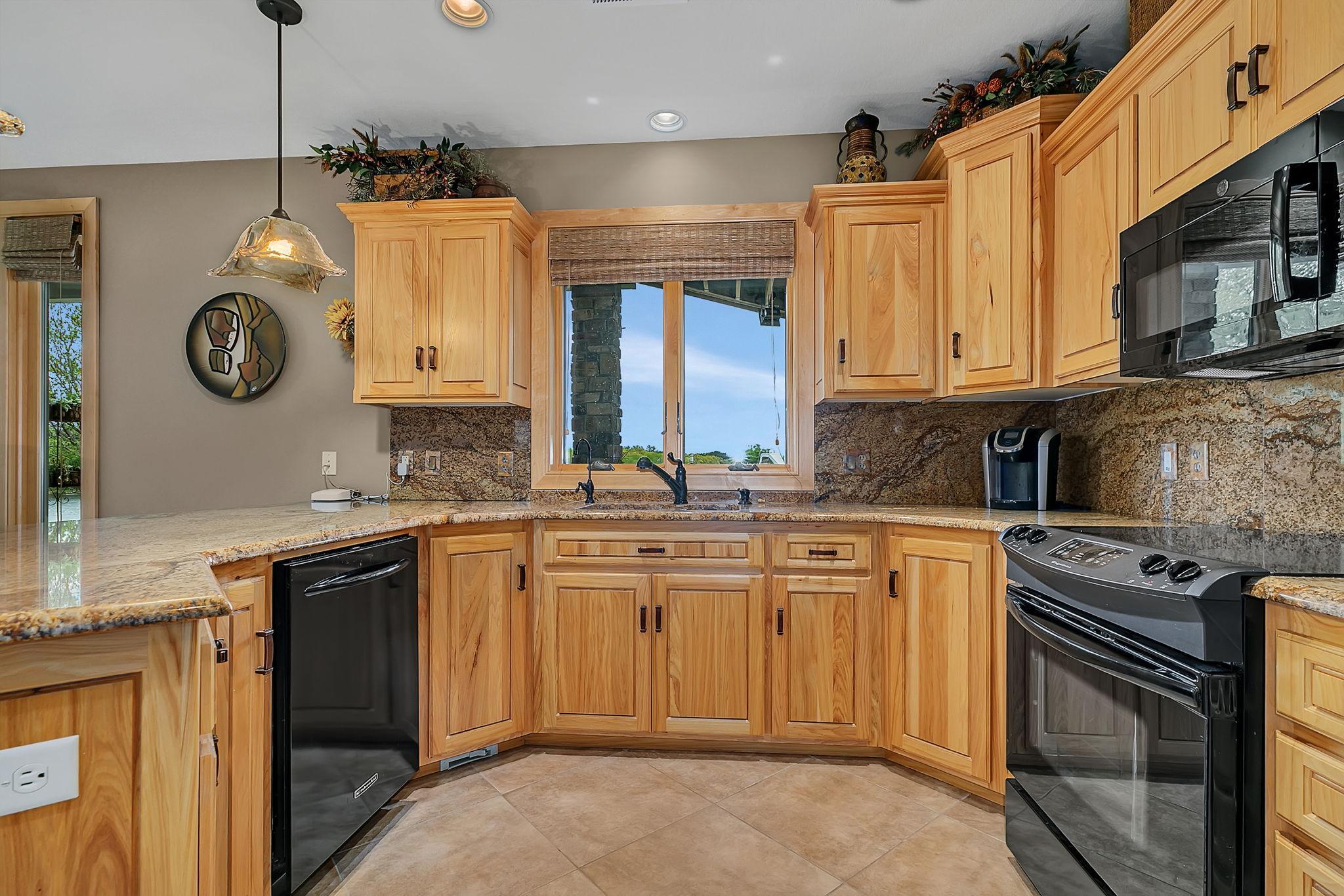 Kitchen lookout window overlooking river views.
