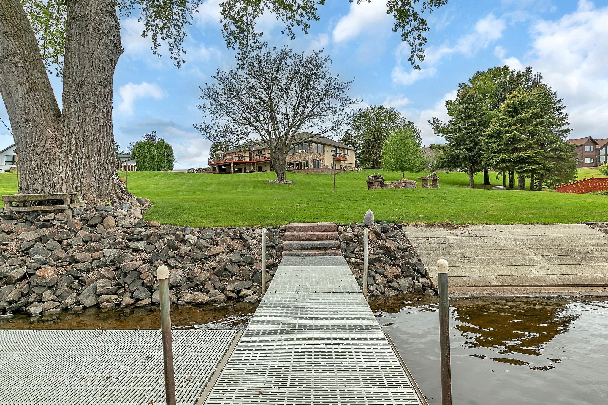 Dock will stay, and enjoy your own personal concrete access. Large tree makes for shade over your boat in between rides.