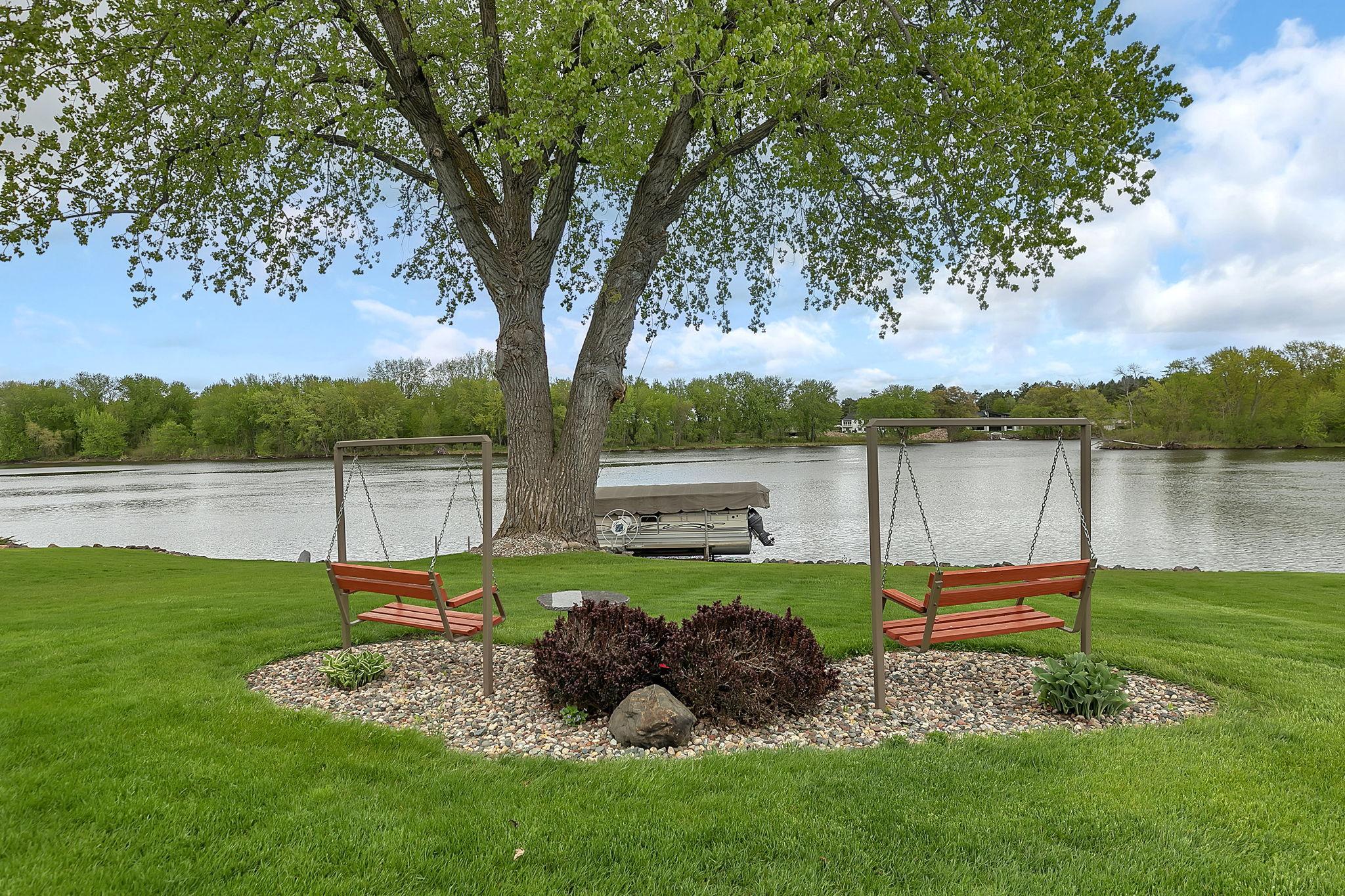 Bench swings overlooking the Mississippi River.