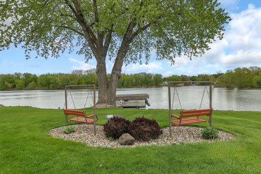 Bench swings overlooking the Mississippi River.