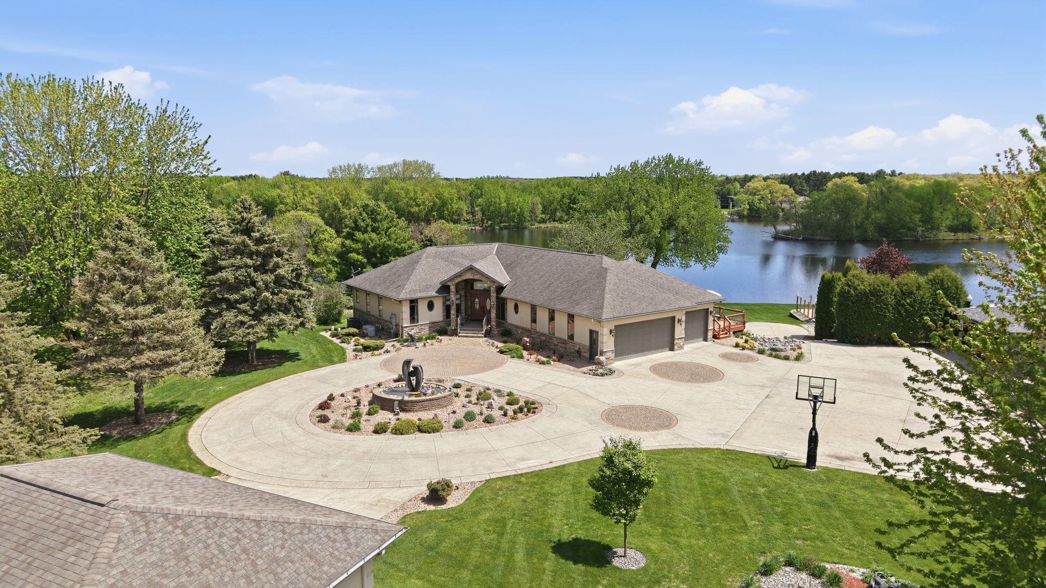 Front granite fountain sets the tone for the rest of this extravagant property.