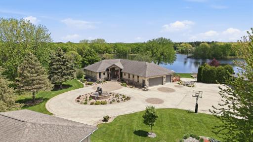 Front granite fountain sets the tone for the rest of this extravagant property.