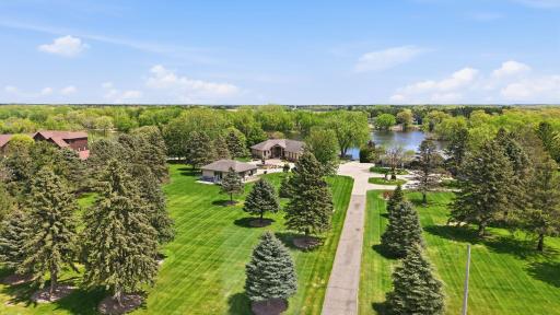 Mature landscaping adds character and visual appeal to the property. Serene feel as you navigate the long shared driveway, exiting busy and entering calm.