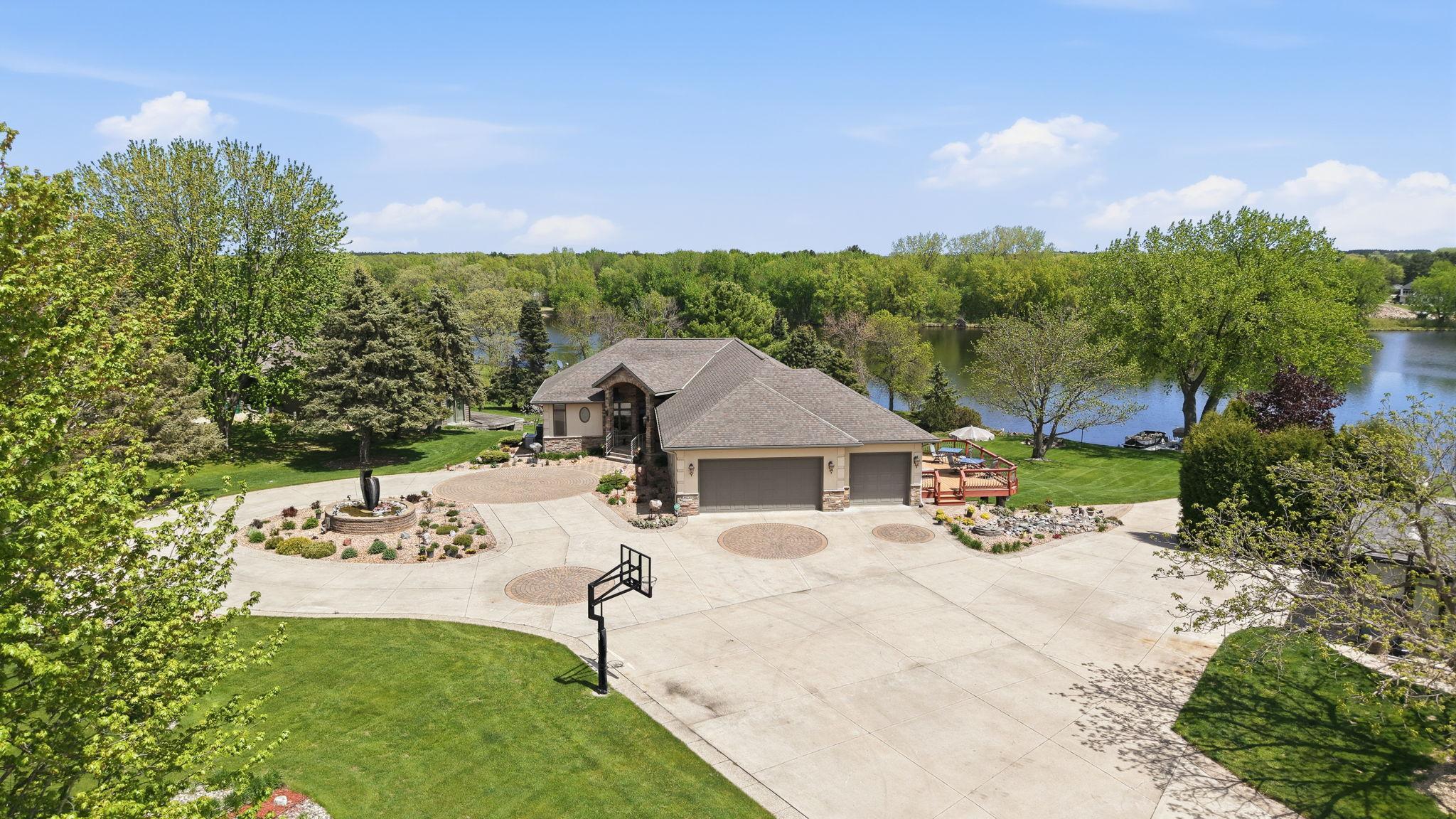 Driveway accommodates multiple vehicles and a full turn around.