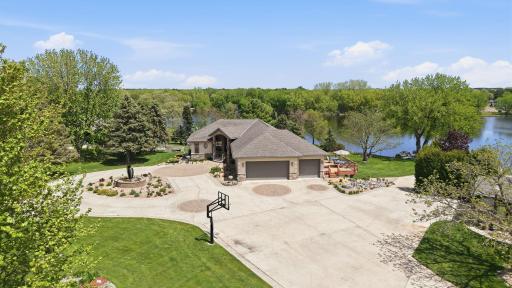 Driveway accommodates multiple vehicles and a full turn around.