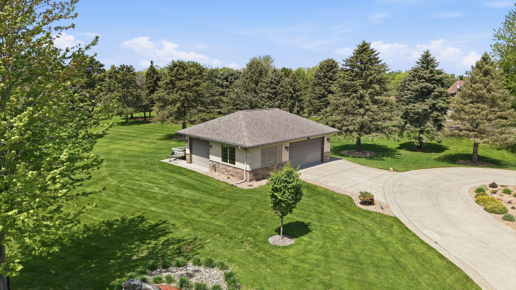 Detached garage offers excellent potential for workshop or hobby use. Accessory garage has two overhead doors, is insulated, heated and the floors and walls are finished. Addtional park pad behind the garage for trailers.