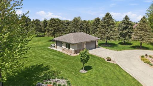 Detached garage offers excellent potential for workshop or hobby use. Accessory garage has two overhead doors, is insulated, heated and the floors and walls are finished. Addtional park pad behind the garage for trailers.