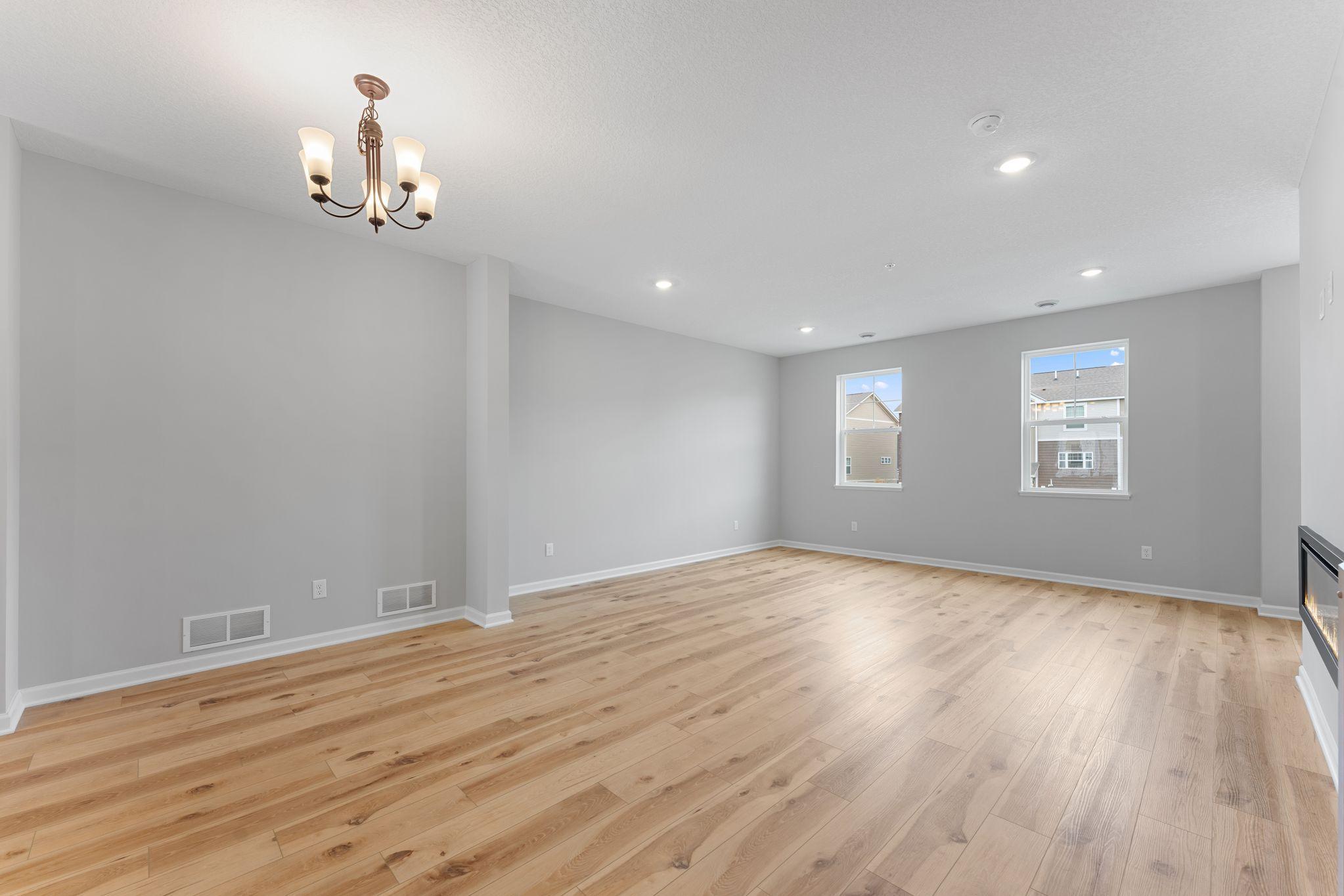 View from dining area to family room. Similar home shown, options can vary.